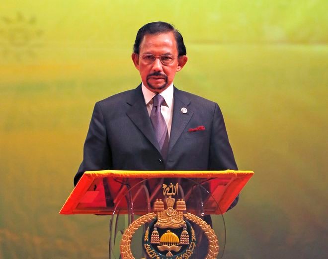 Brunei invokes laws allowing stoning for gay sex, adultery